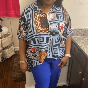 Clearing out closet! Anyone need a cute, colorful blouse?